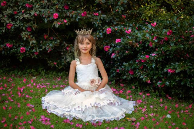 Princess sitting on the grass